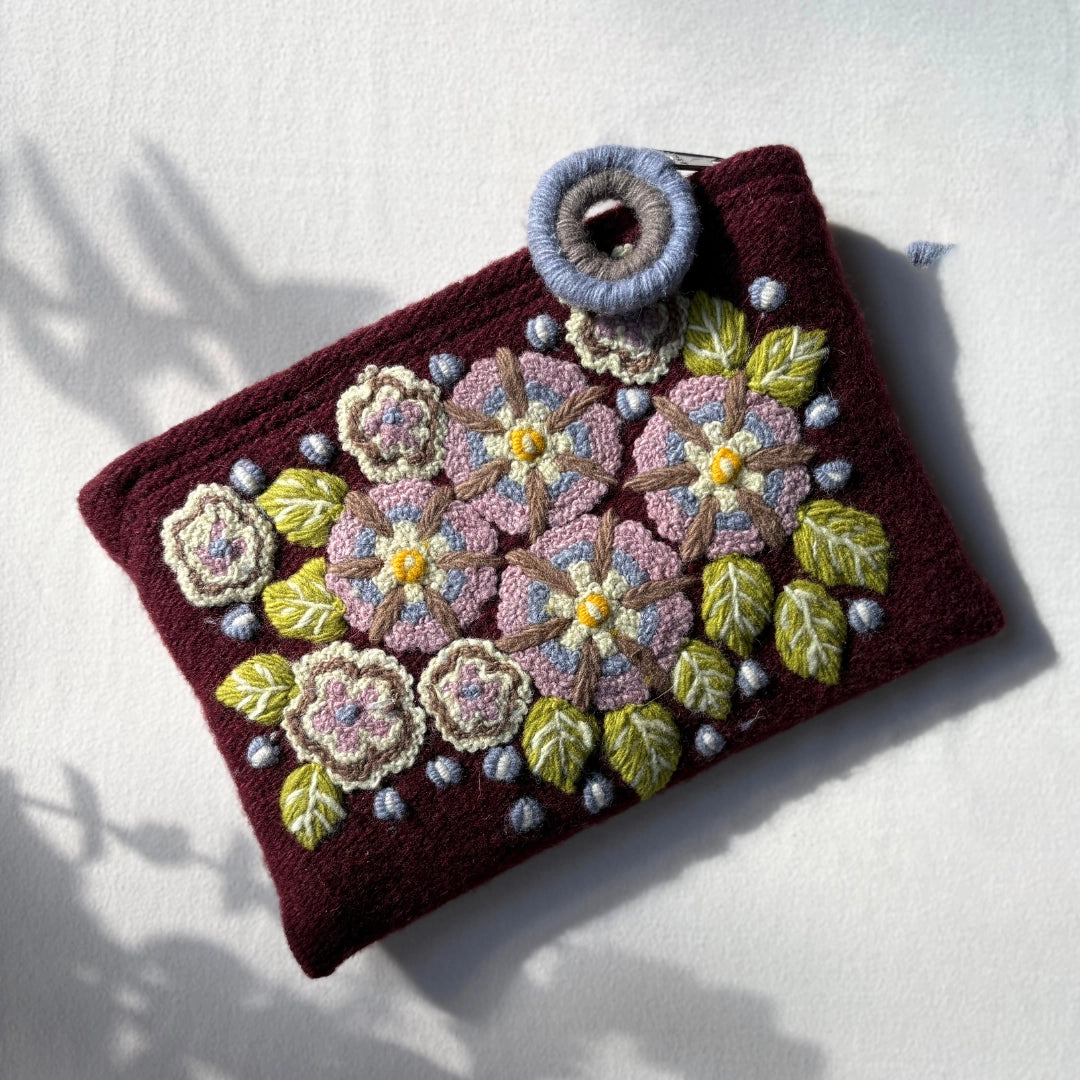 plum floral embroidered wool clutch
