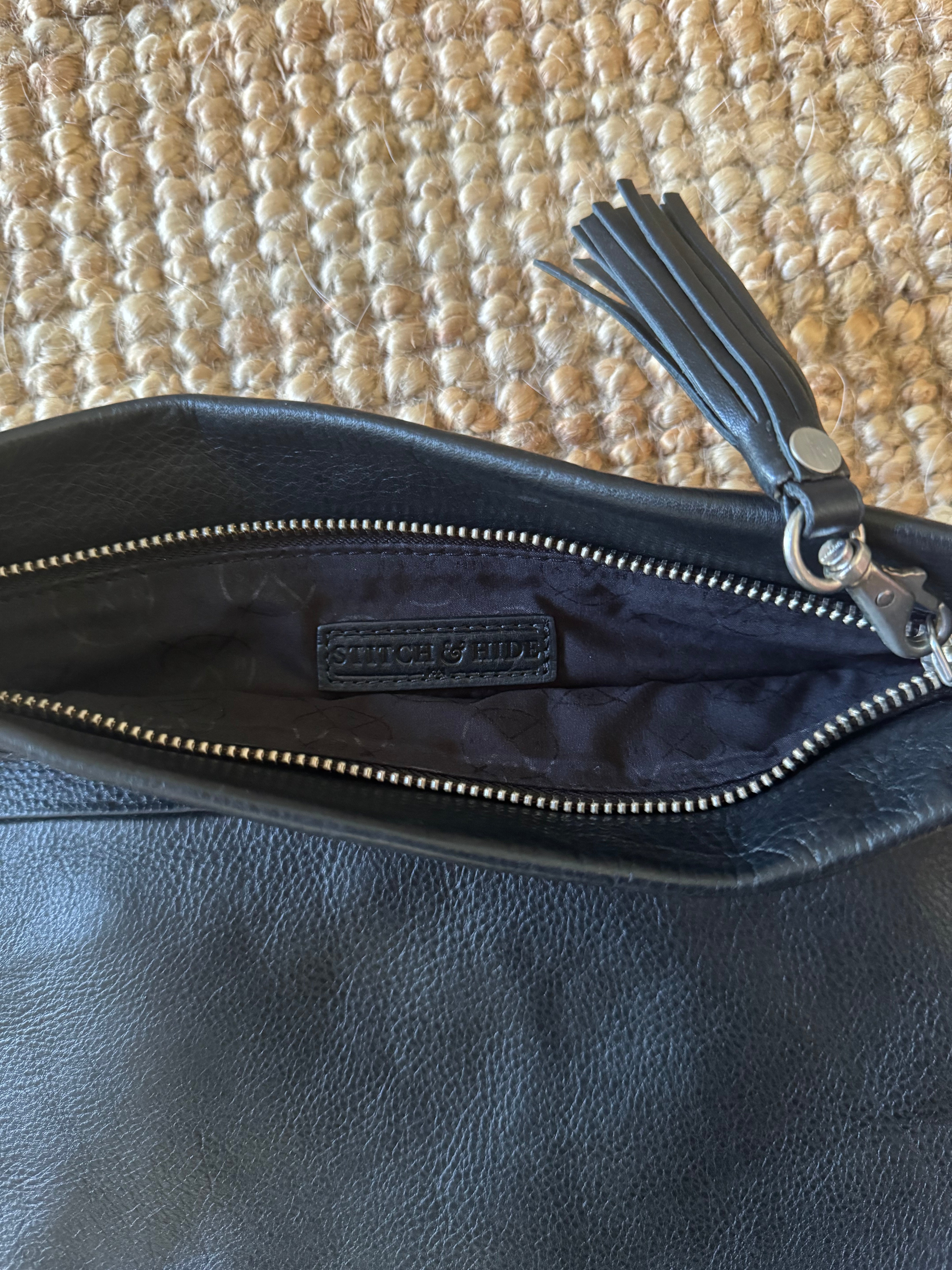 Pre-loved Status Anxiety black leather clutch bag