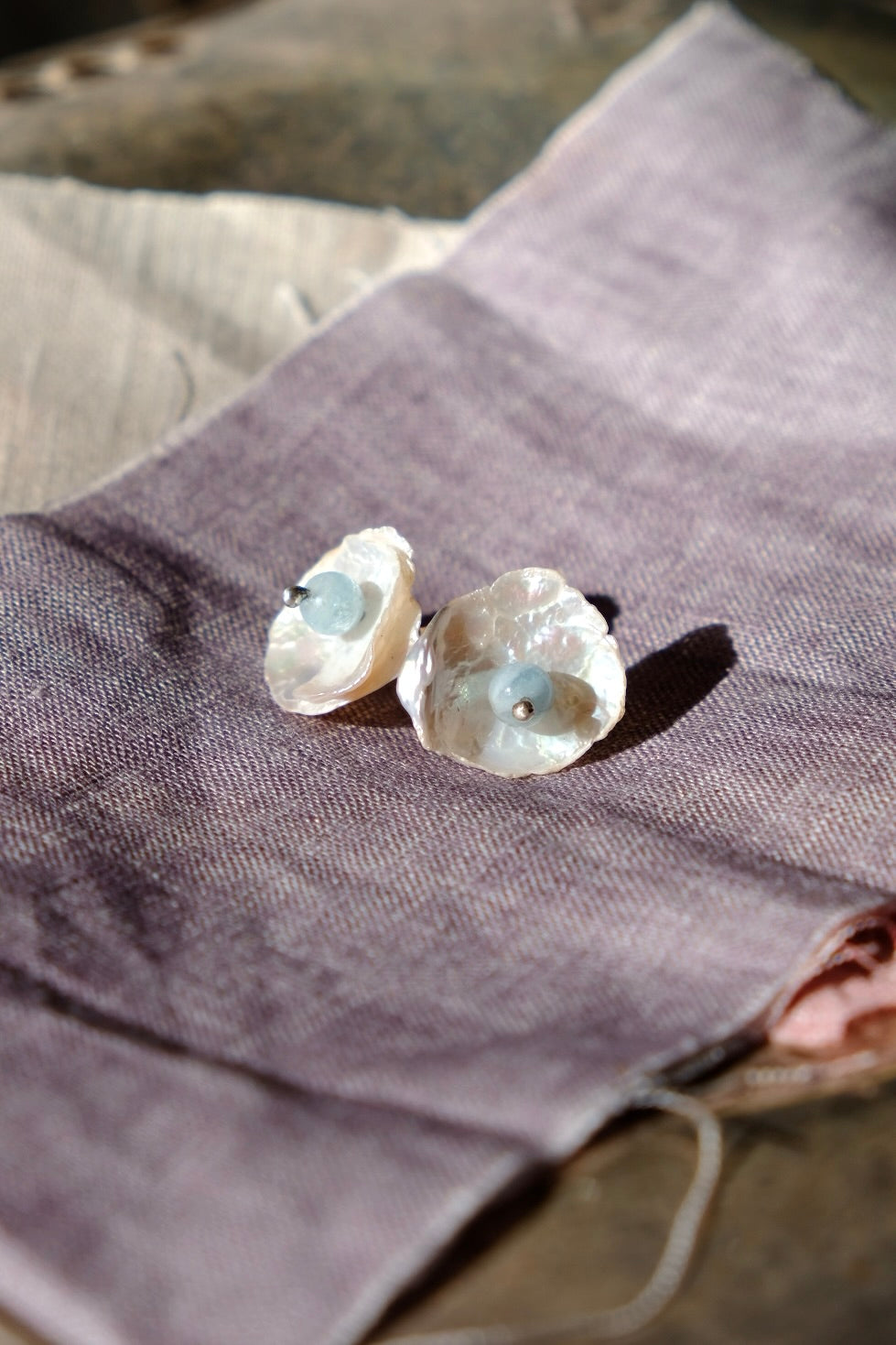 Cornflake Keshi pearl stud earrings with acquamarine bead