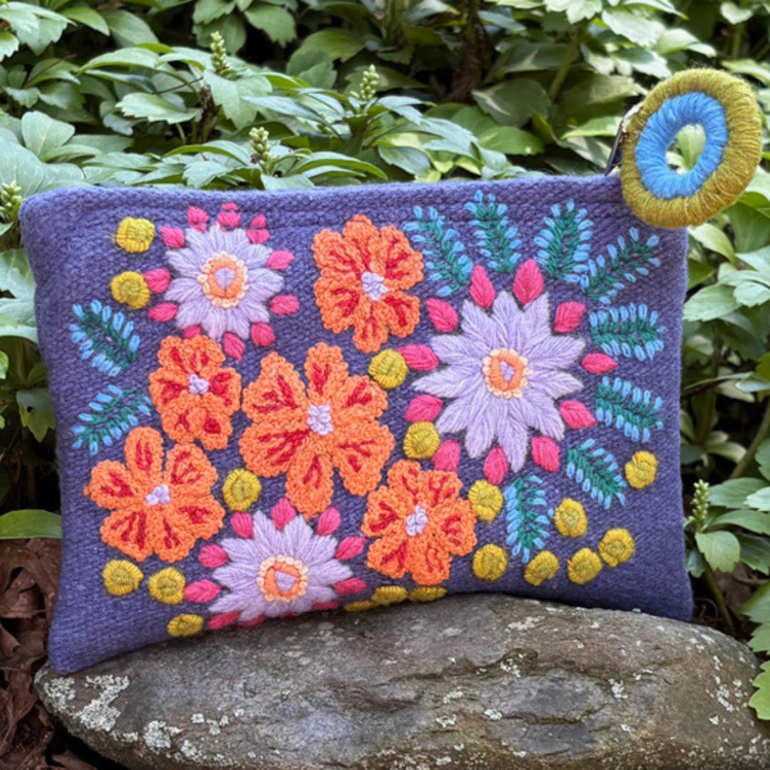 purple floral embroidered wool clutch