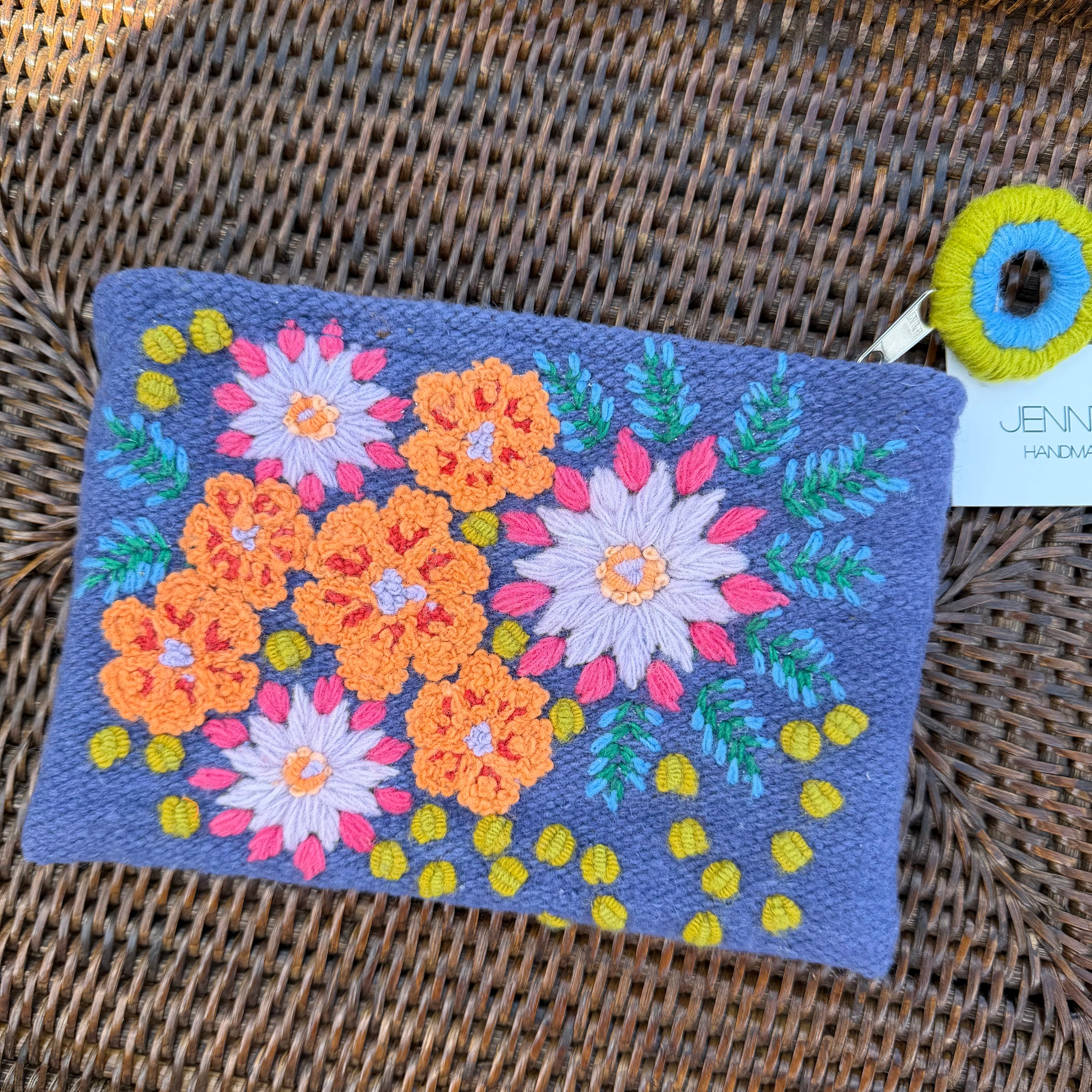 purple floral embroidered wool clutch