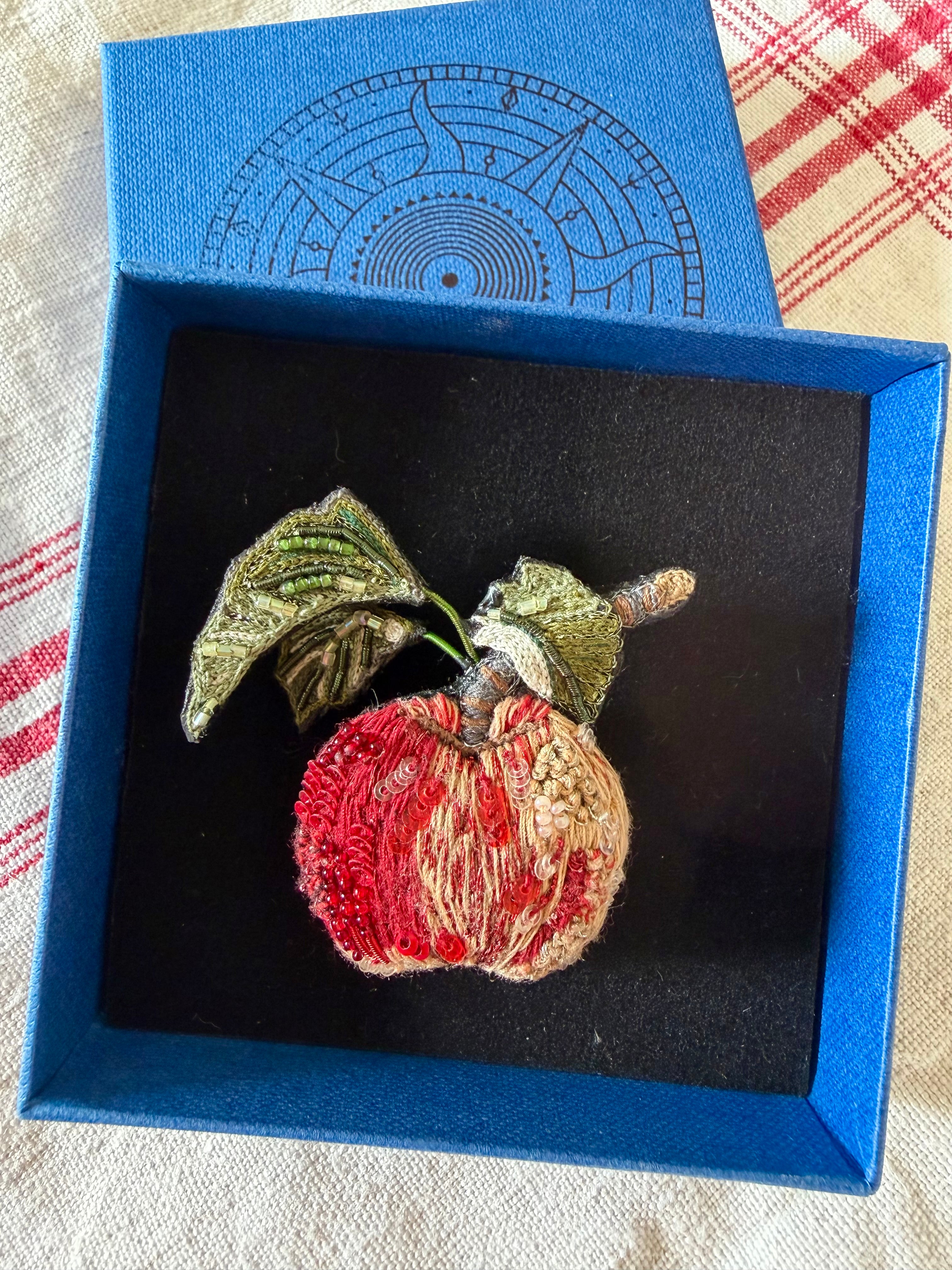 Apple brooch