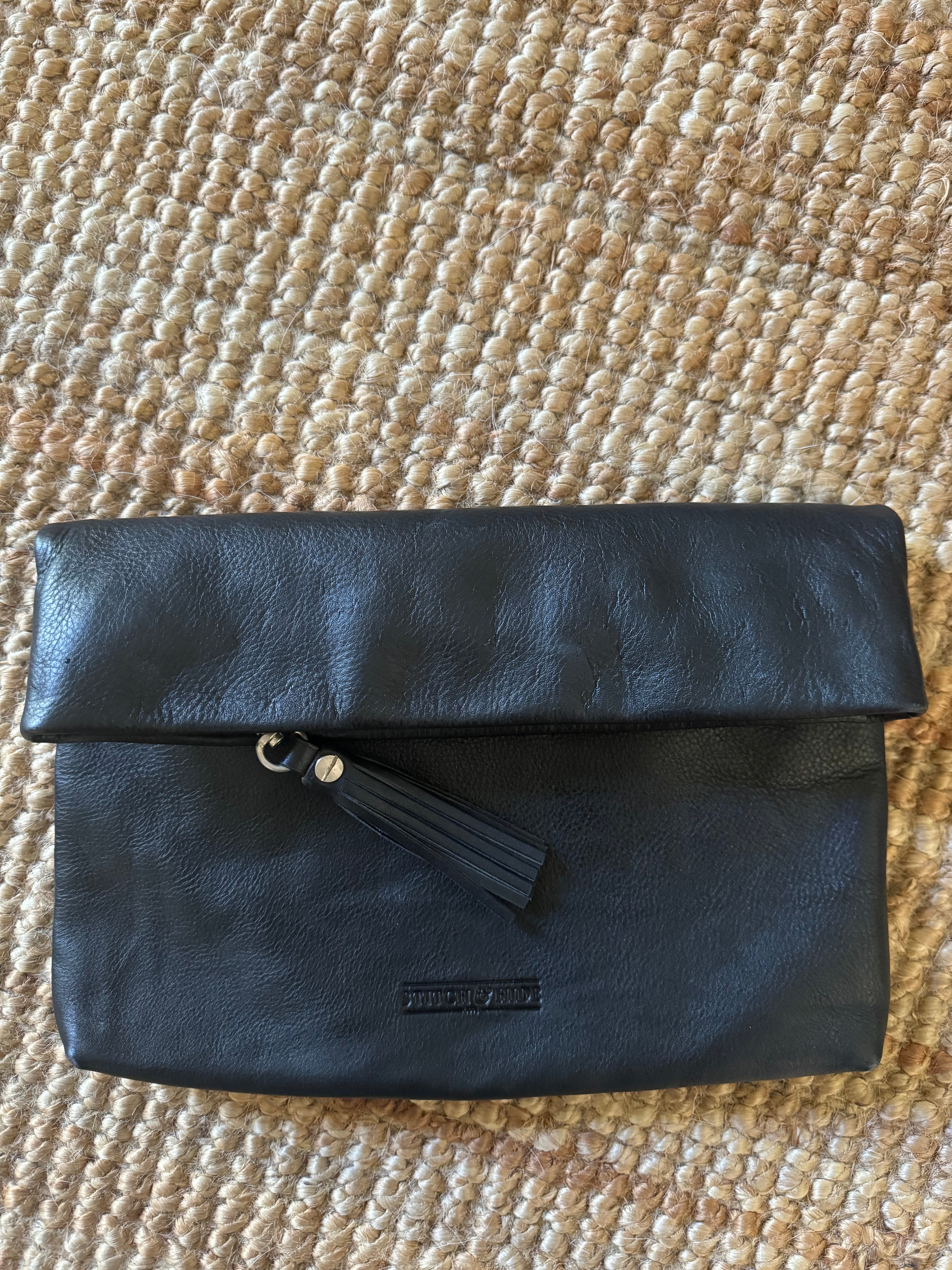 Pre-loved Status Anxiety black leather clutch bag