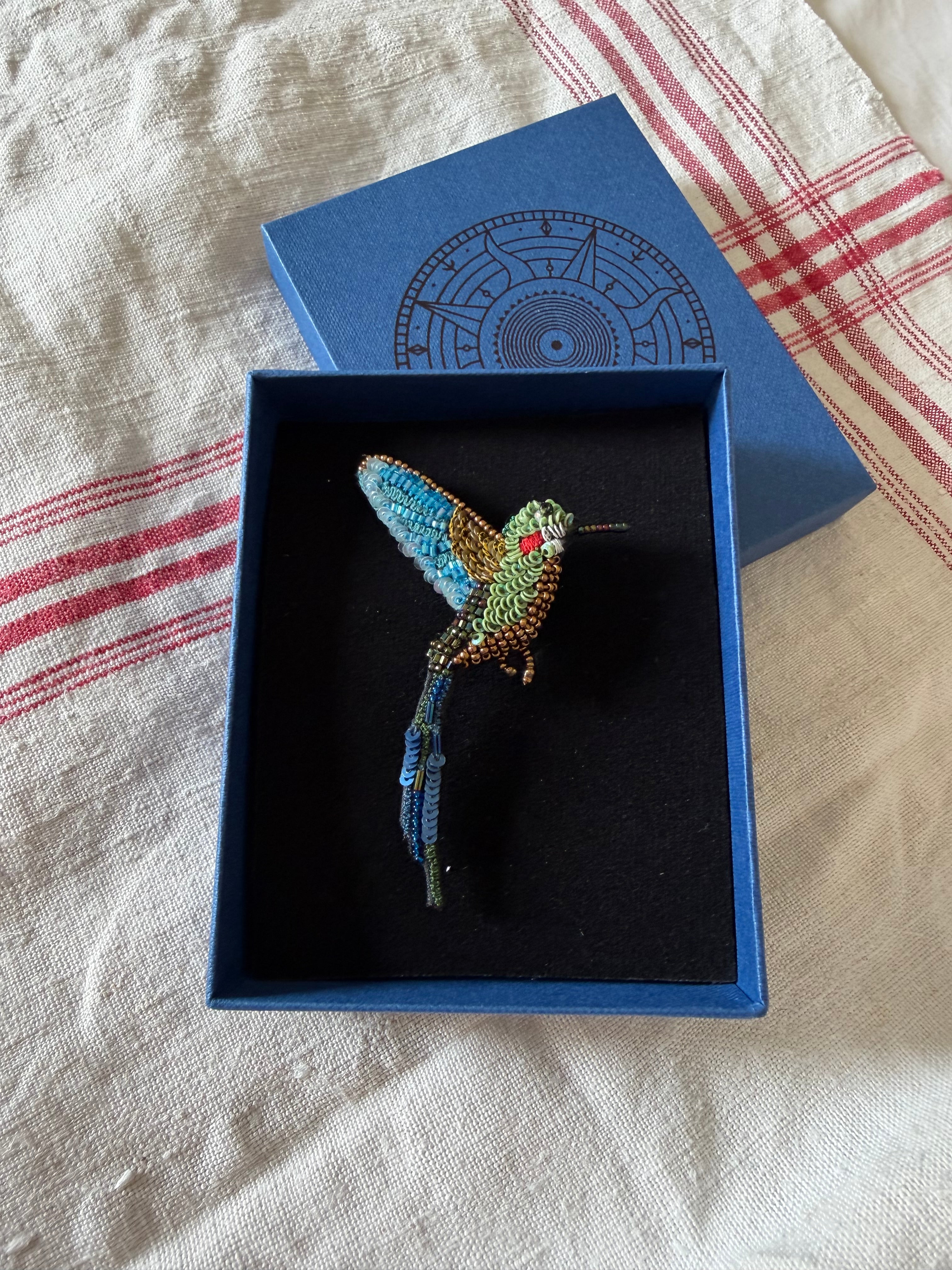 Tropical hummingbird brooch