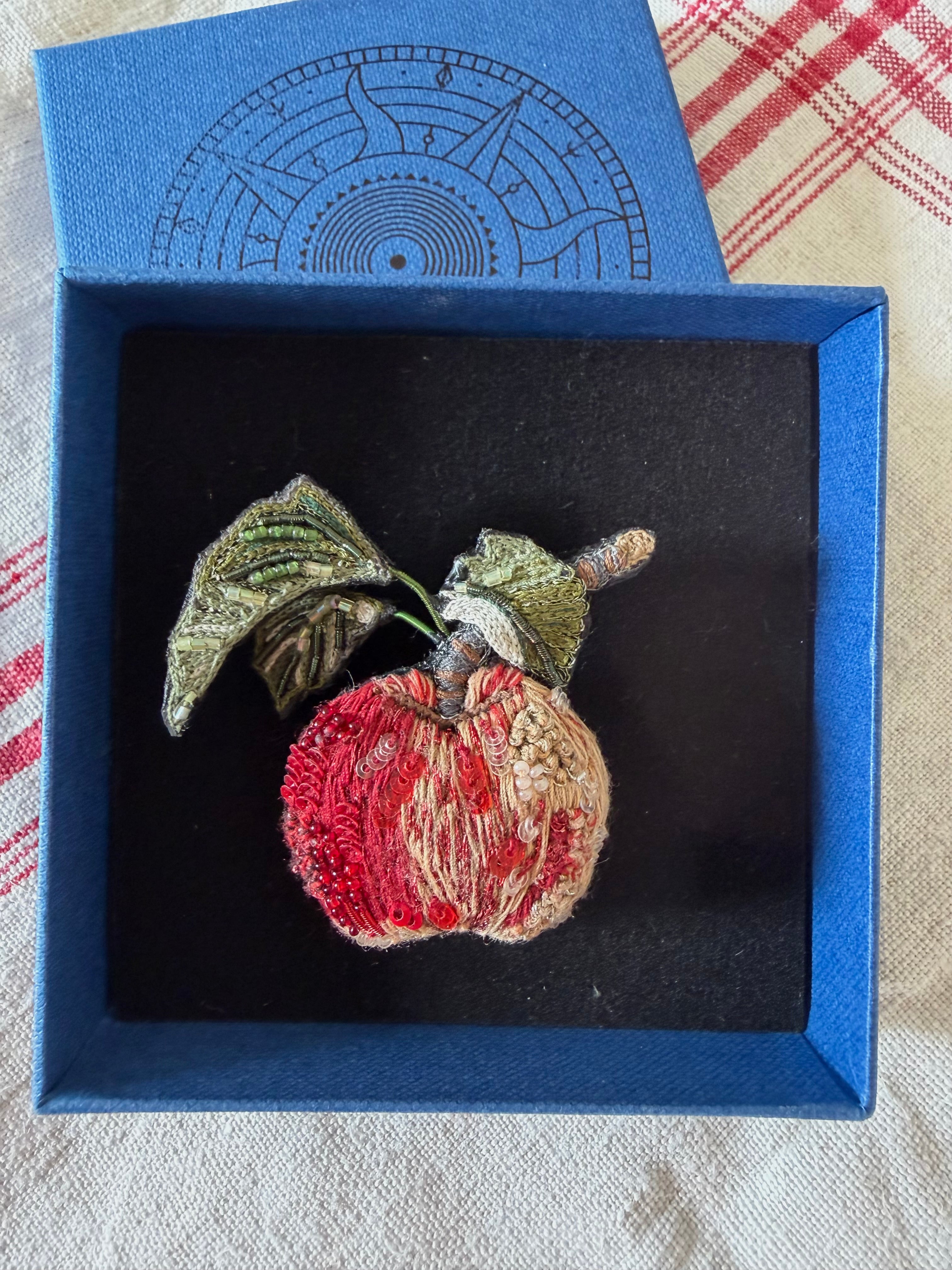 Apple brooch