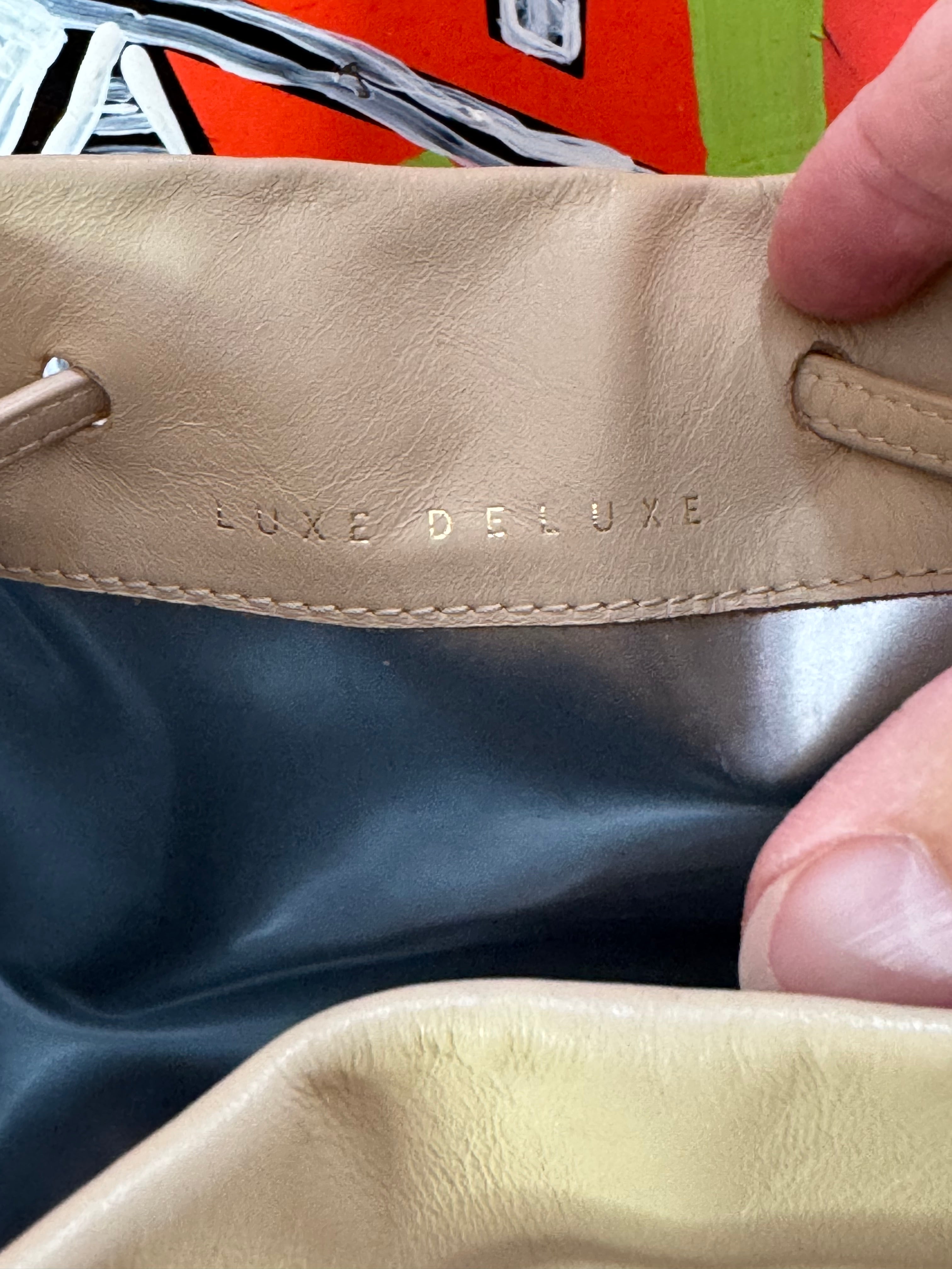 Pre-loved Luxe Delux leather bucket bag