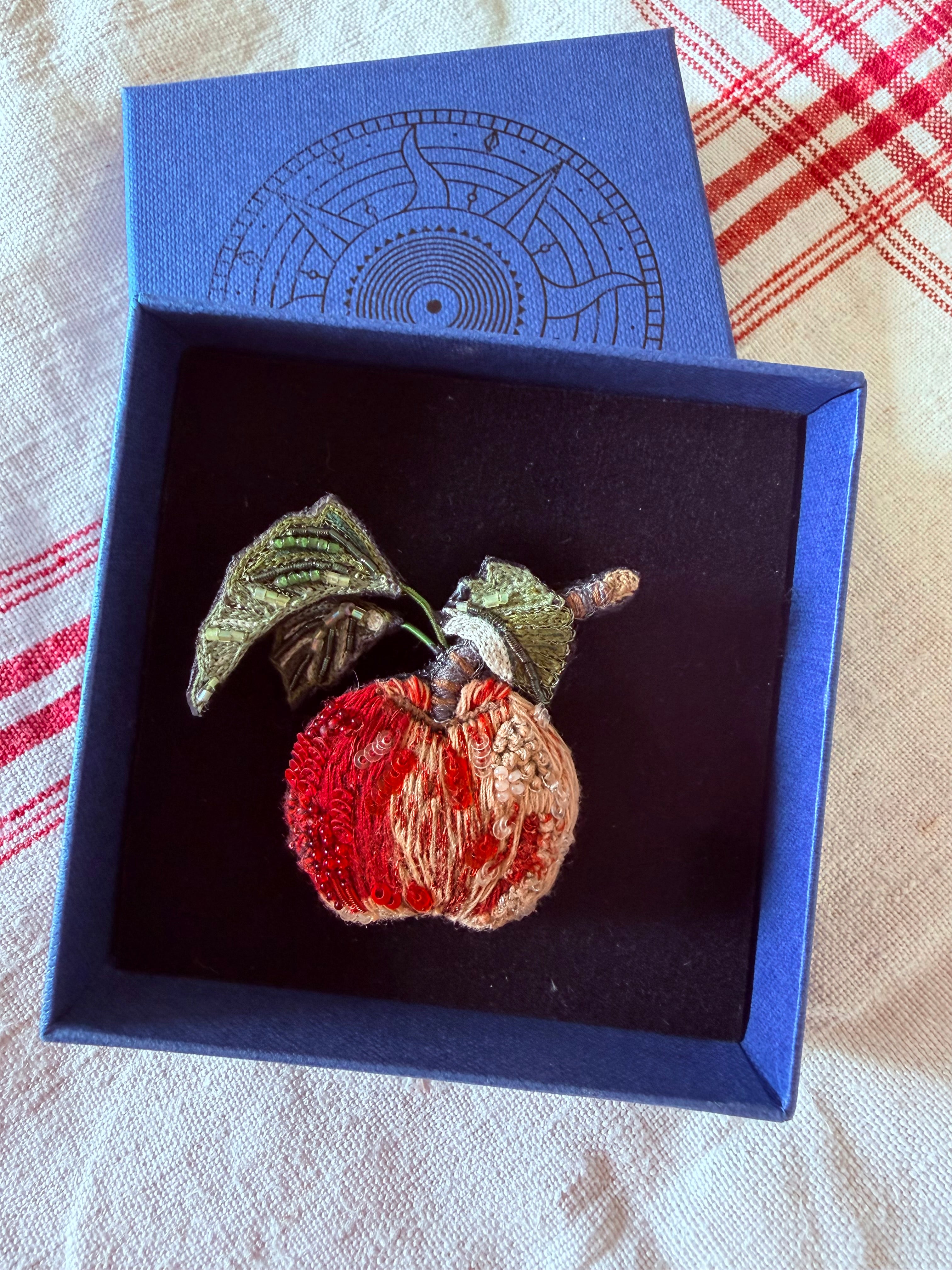 Apple brooch