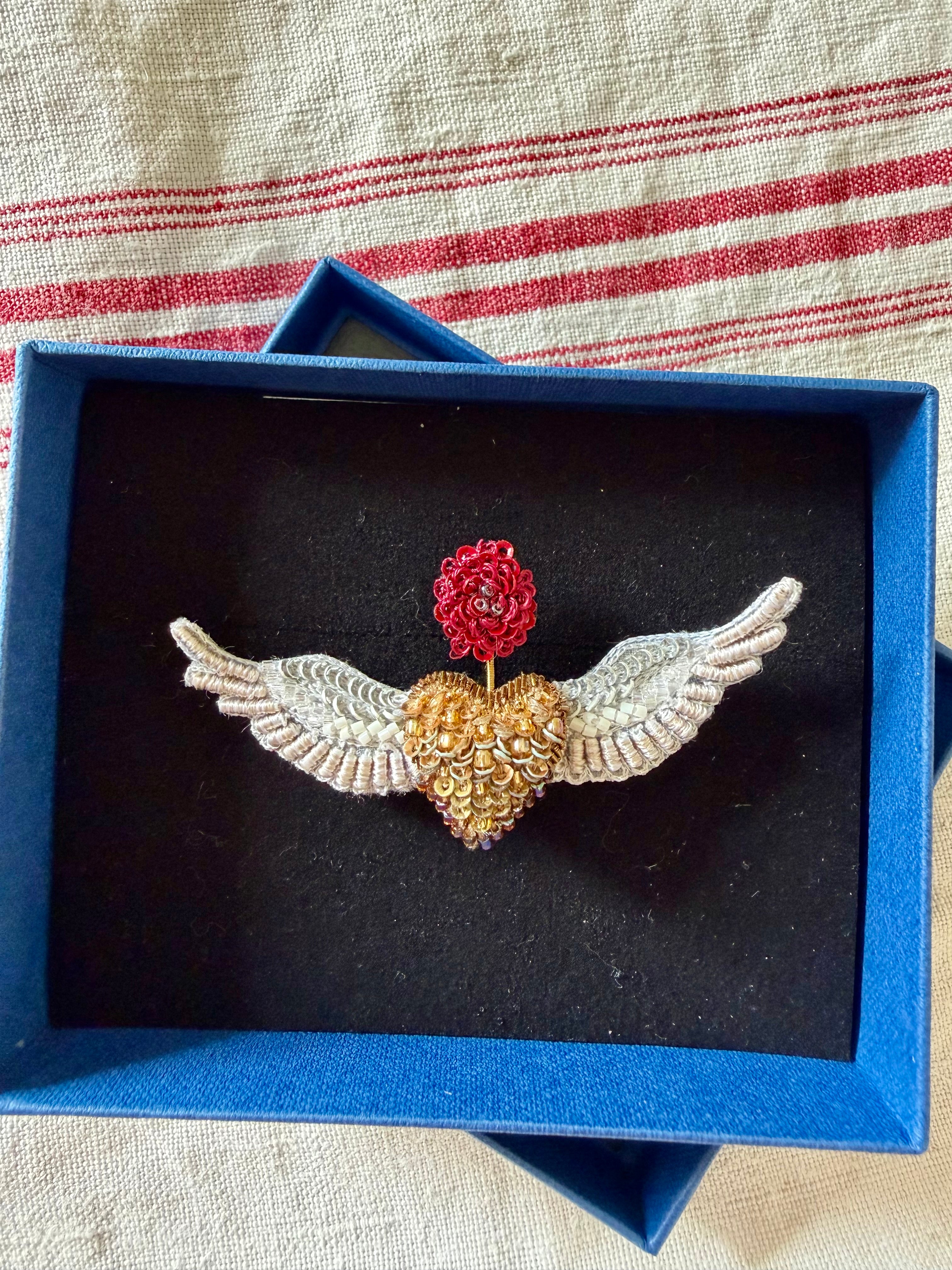 Flying angels brooch