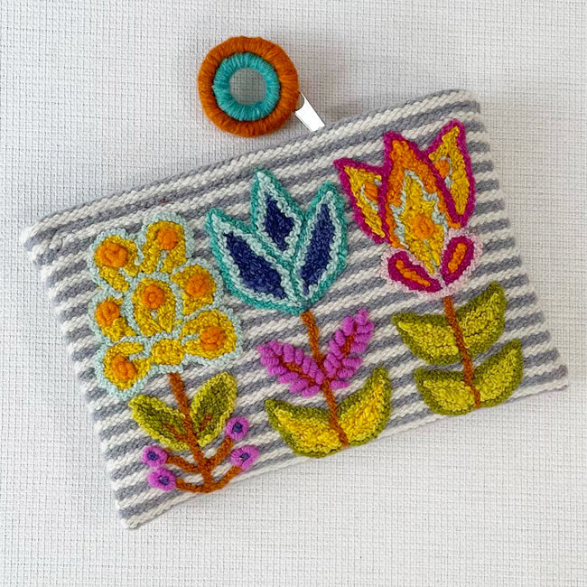 striped floral embroidered wool clutch