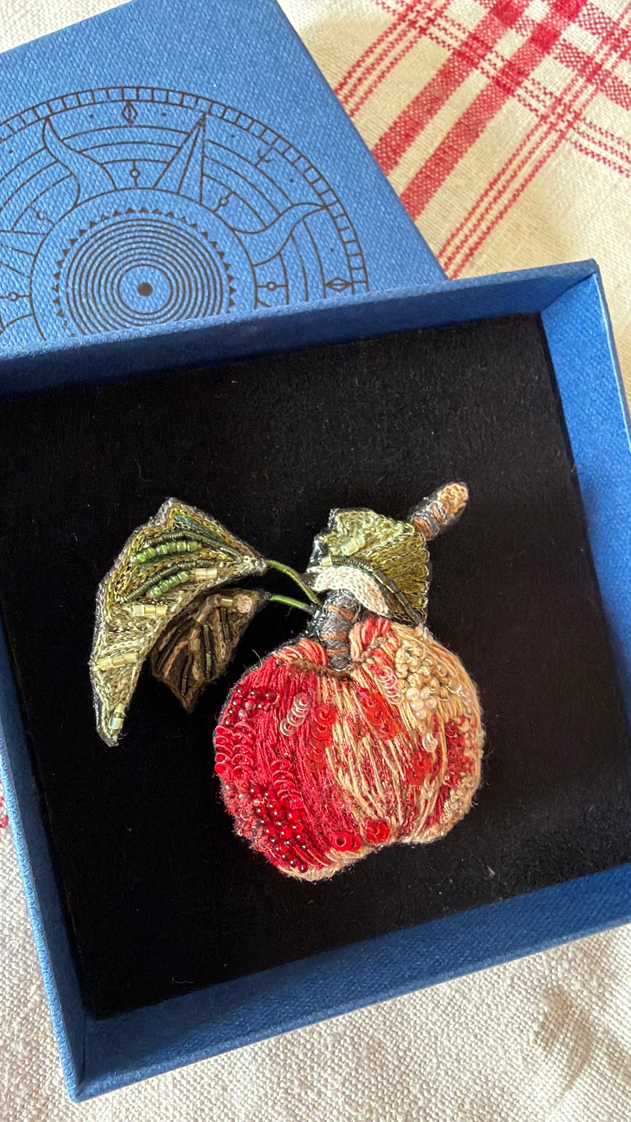 Apple brooch