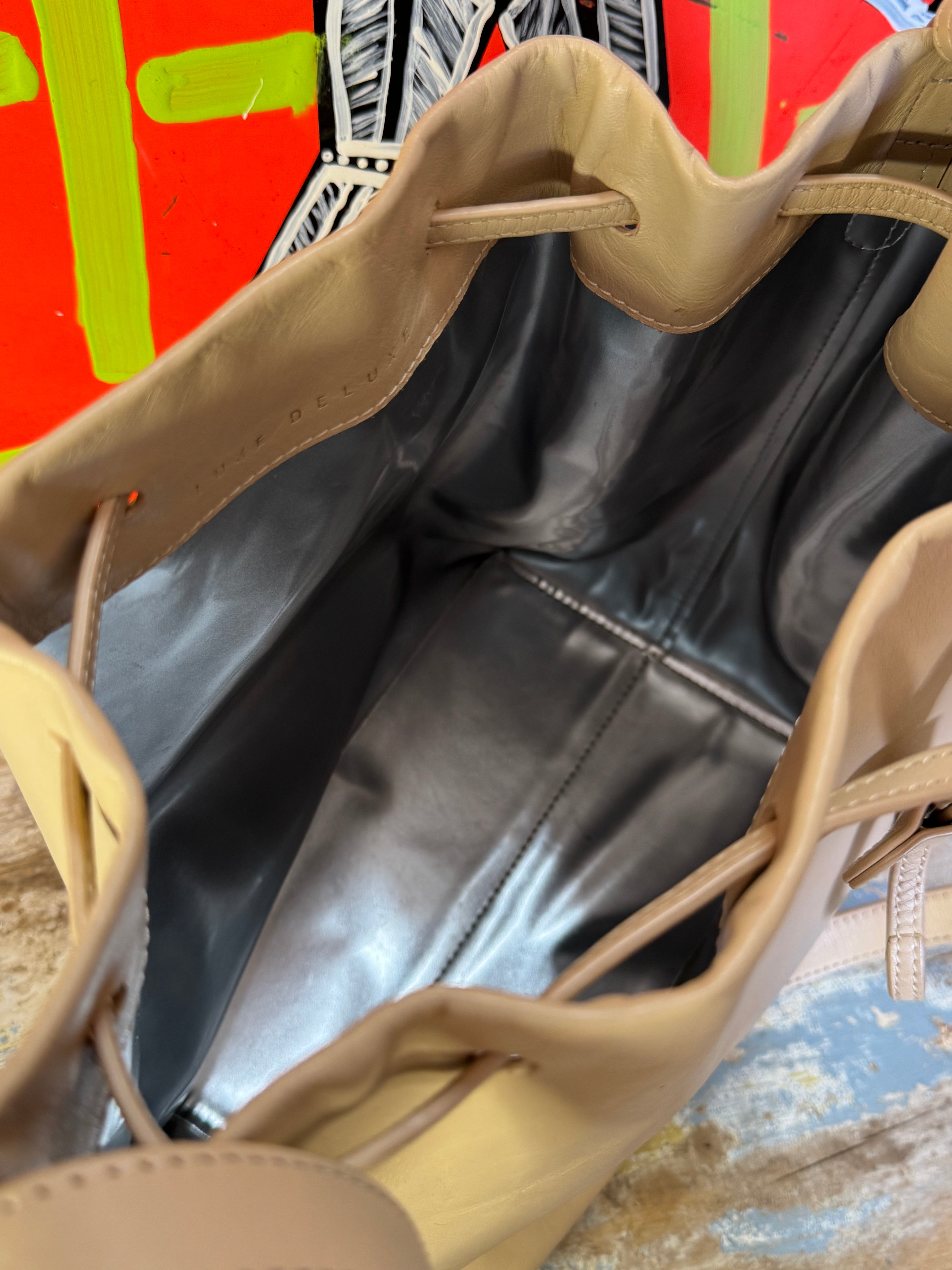 Pre-loved Luxe Delux leather bucket bag