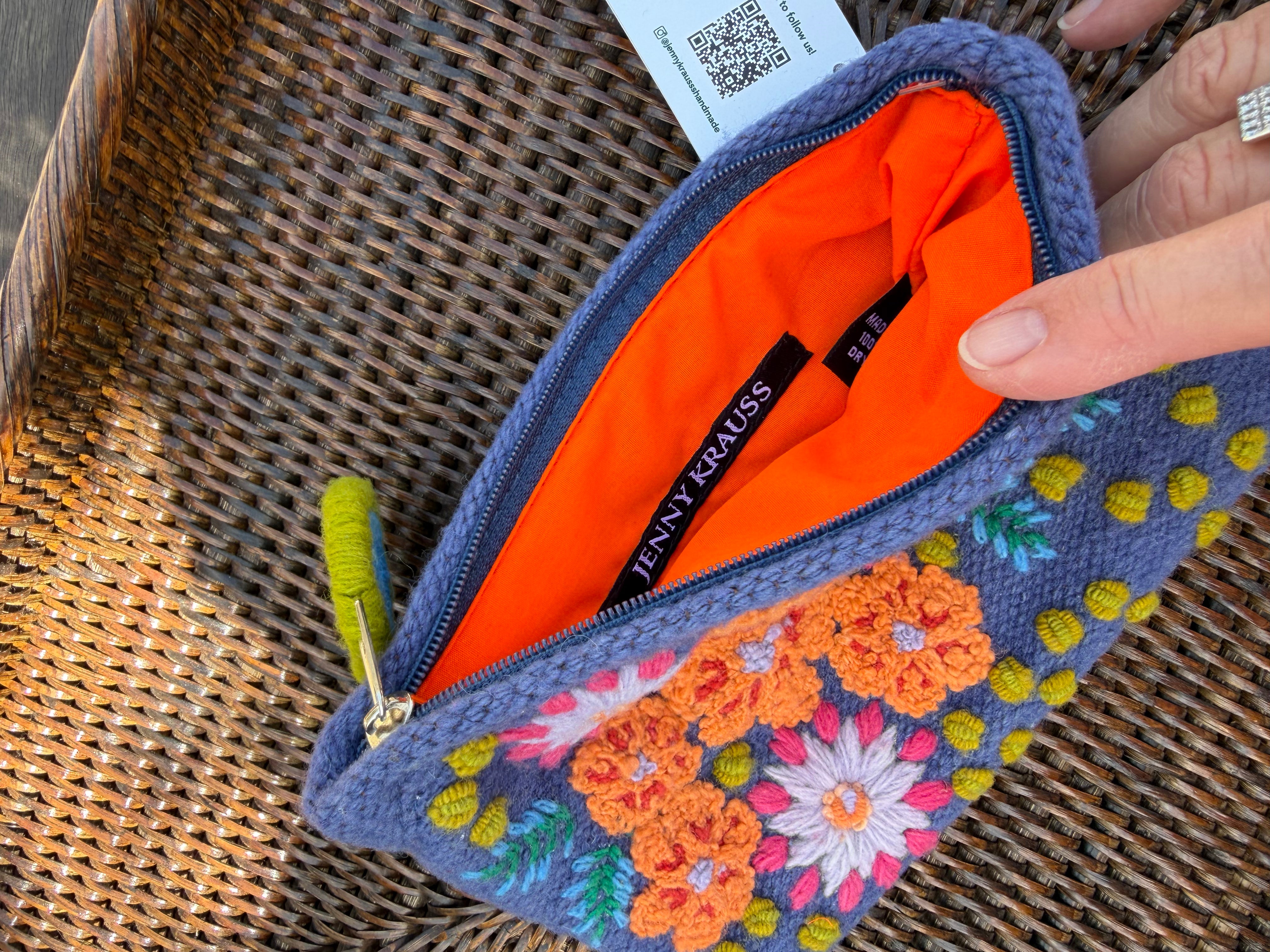 purple floral embroidered wool clutch